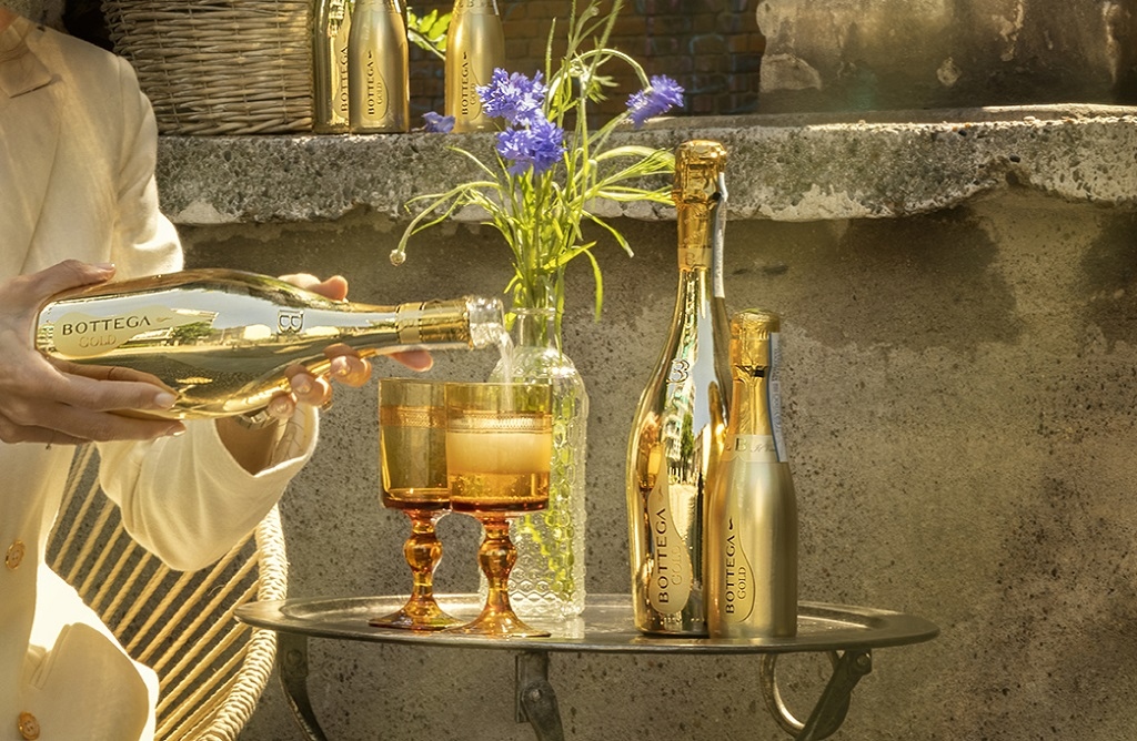 May Your Holidays be Filled with Glamour and Sparkles, Just Like this Gold Bottle of Bottega Bubbly